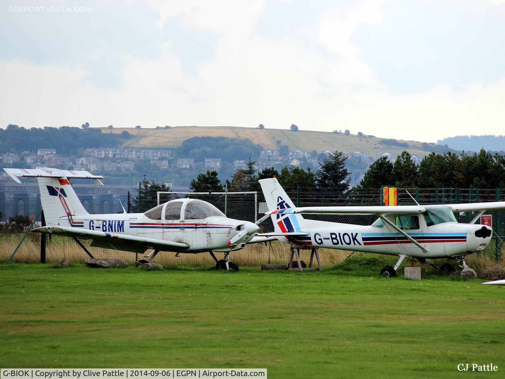 G-BIOK, 1981 Reims F152 C/N 1810, Two occupants in the airfield graveyard at Dundee Riverside Airport EGPN - G-BNIM and BIOK - update June 2015 both aircraft are now gone - destination unknown - scrapyard ?