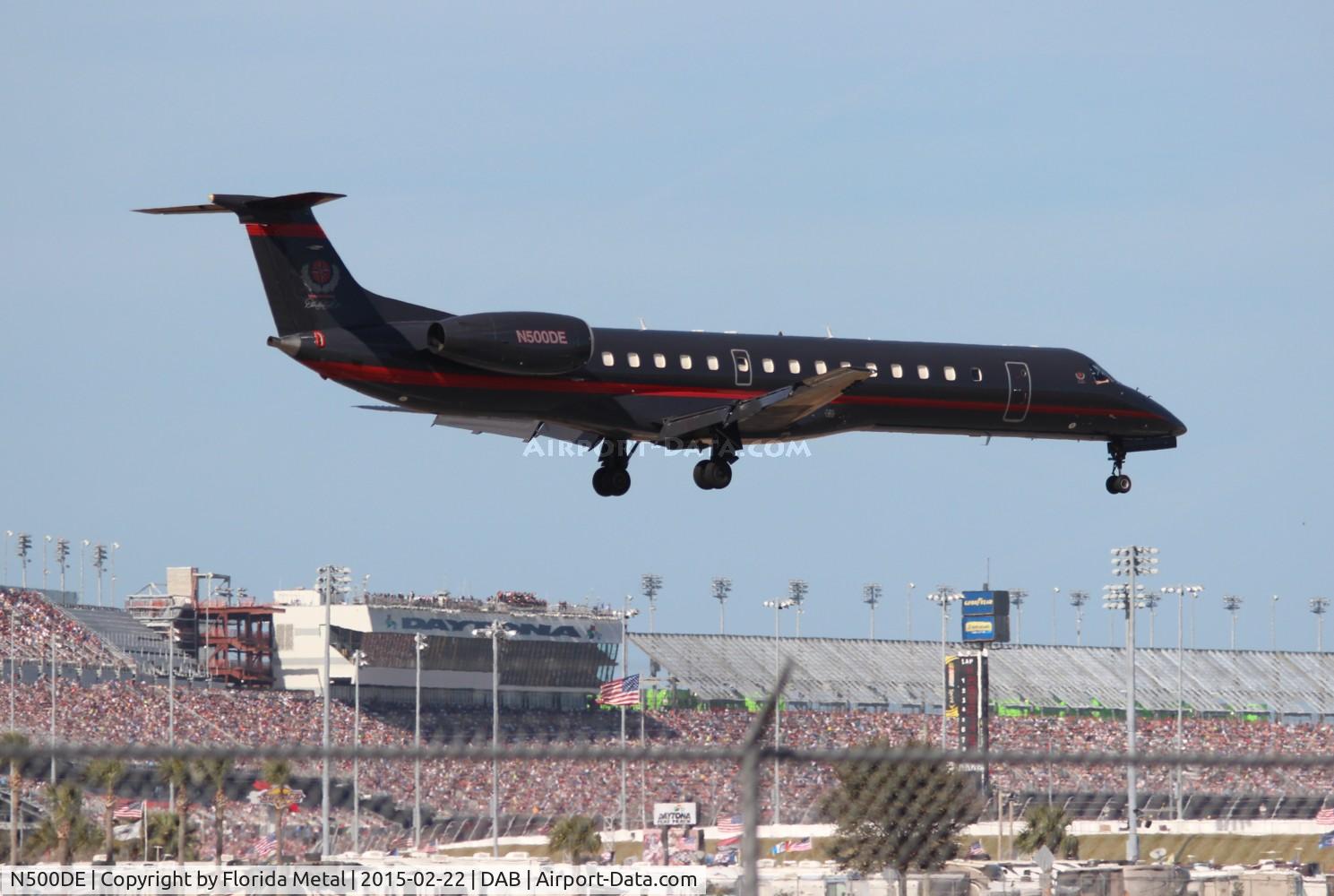 N500DE, 1998 Embraer EMB-145EP (ERJ-145EP) C/N 145084, Dale Earnhardt Inc Embraer in front of the Daytona Speedway