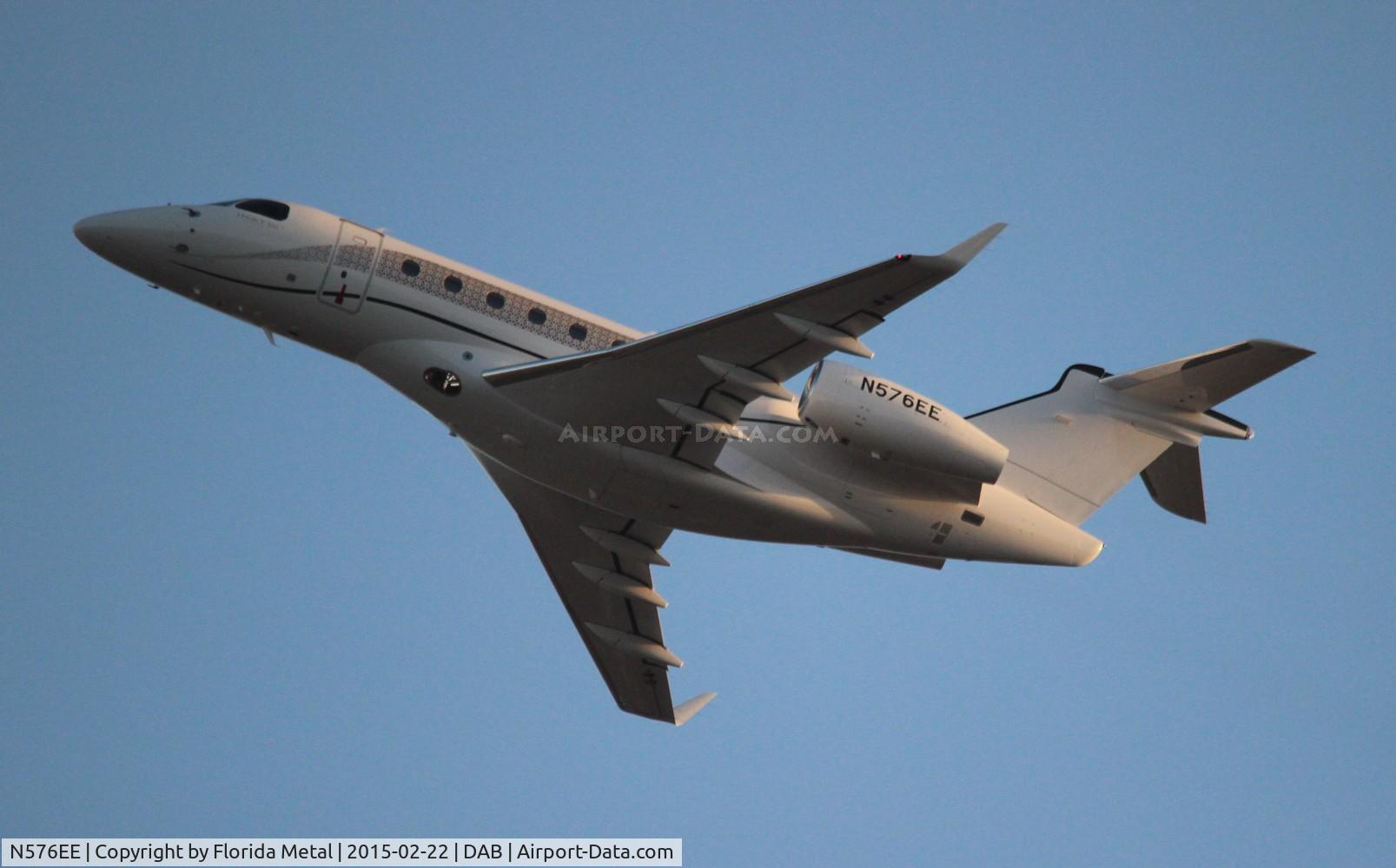 N576EE, 2014 Embraer EMB-550 Legacy 500 C/N 55000012, Legacy 500 demonstrator departing Daytona 500