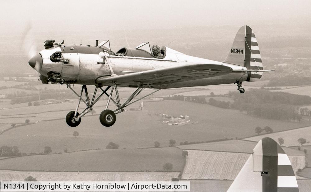 N1344, 1943 Ryan ST3KR C/N 2086, shots of Ryan and Fairchild taken from an airfield in mid England - I forget which.  John Farley flying the Ryan.