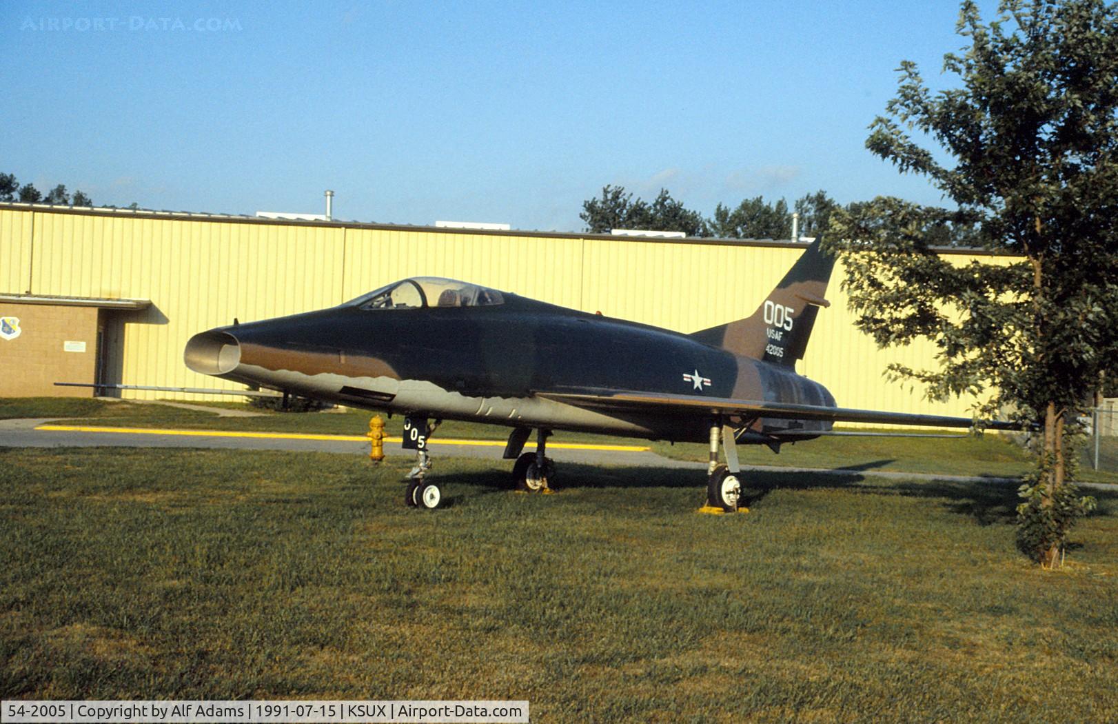 54-2005, 1954 North American F-100C  Super Sabre C/N 217-266, At the Air National Guard Base, Sioux City, Iowa in 1991. It has since been moved inside the base, but is still visible from the road.