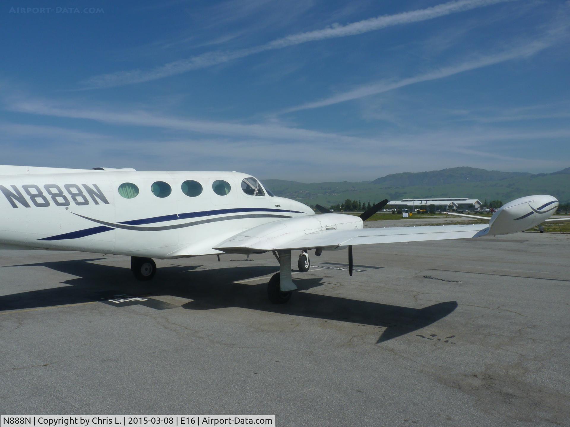 N888N, 1973 Cessna 340 C/N 340-0312, A transient Cessna 340 sits in front of the South County Magnum Aviation hangar.