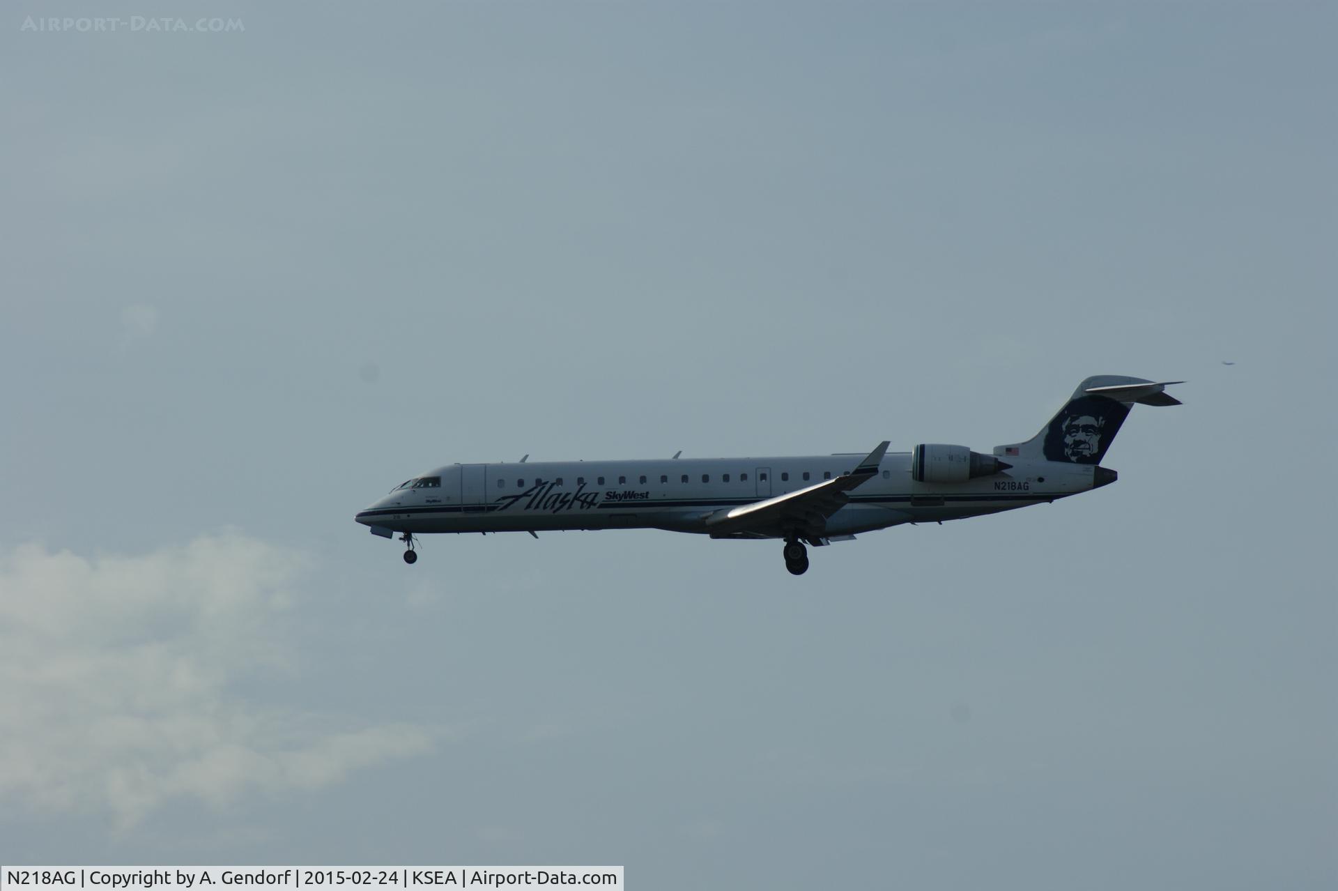 N218AG, 2005 Canadair CL-600-2C10 Regional Jet CRJ-700 C/N 10205, Sky West, Alaska Airlines cs., is here landing at Seattle-Tacoma Int'l(KSEA)