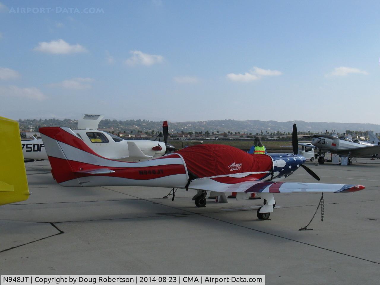 N948JT, 2000 Lancair 360 C/N 001 (N948GT), 2000 Thompson LANCAIR T360, Lycoming IO-360, patriotic paint scheme mainly covered. Please see earlier photos.