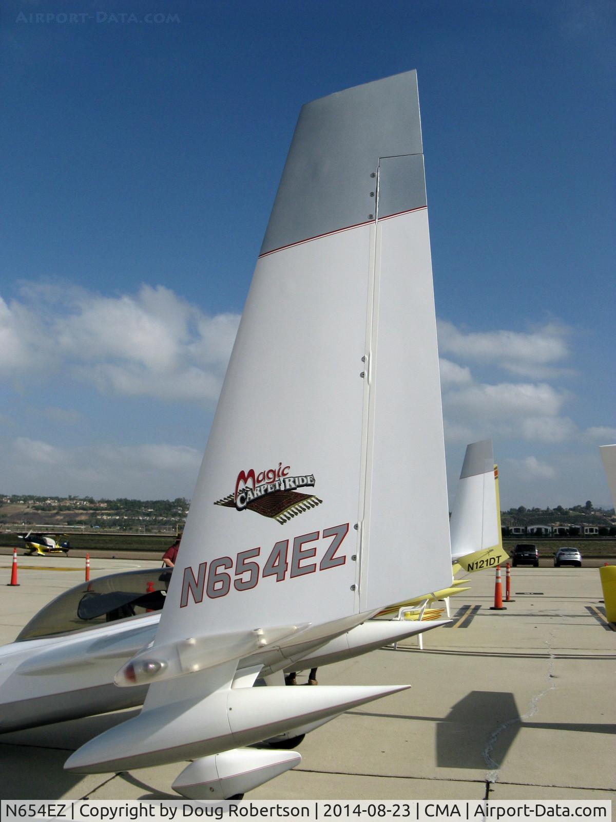 N654EZ, 2006 Rutan Long-EZ C/N 1741, 2006 VOLOVSEK Rutan LONG-EZE, Lycoming IO-320-B1A 160 Hp,  MAGIC CARPET RIDE logo, and under wing cargo pods