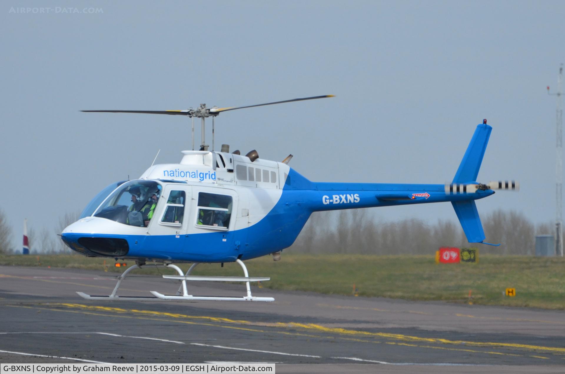 G-BXNS, 1977 Bell 206B JetRanger III C/N 2385, About to land at Norwich.