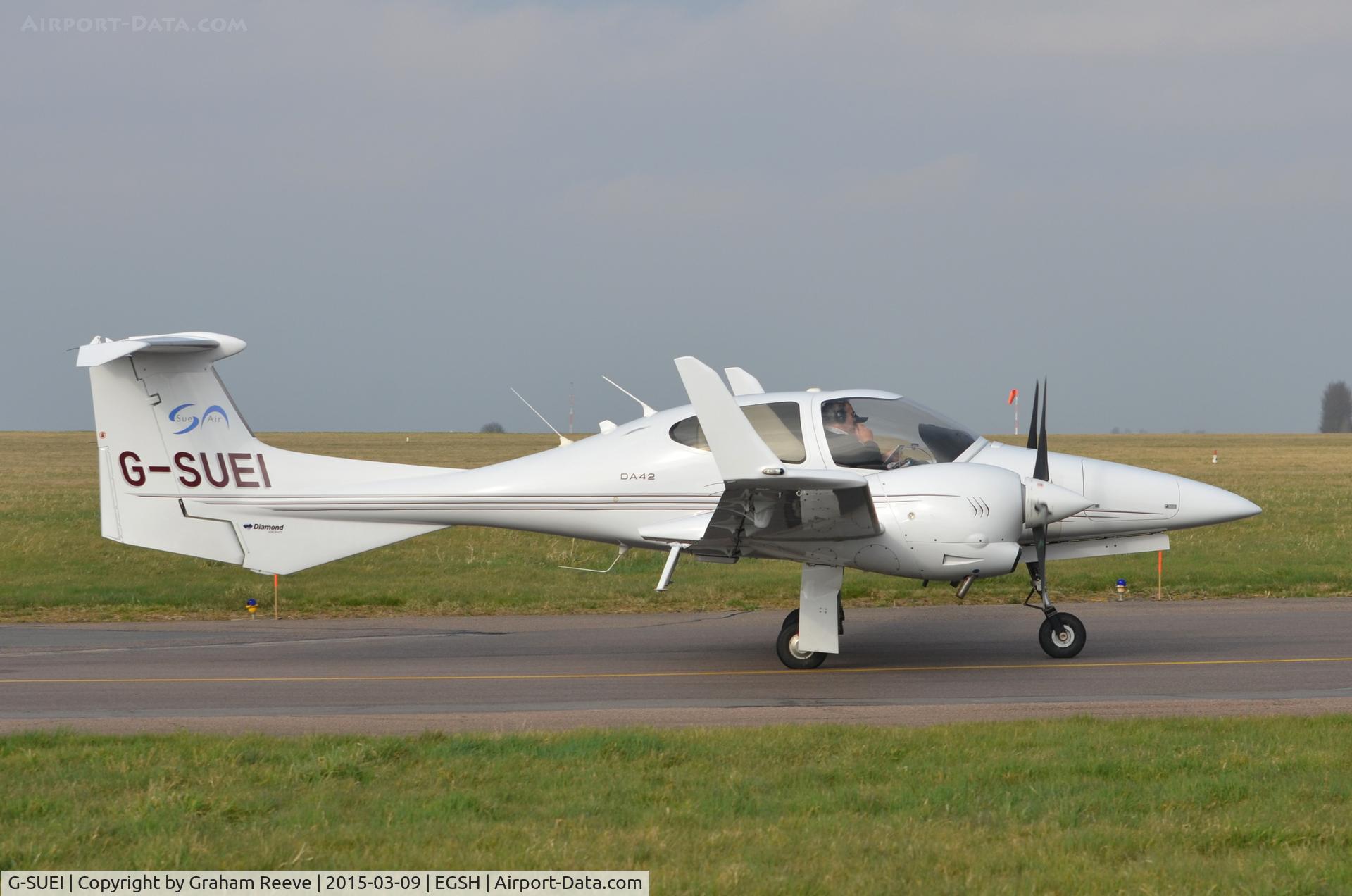 G-SUEI, 2009 Diamond DA-42 Twin Star C/N 42.415, About to depart from Norwich.