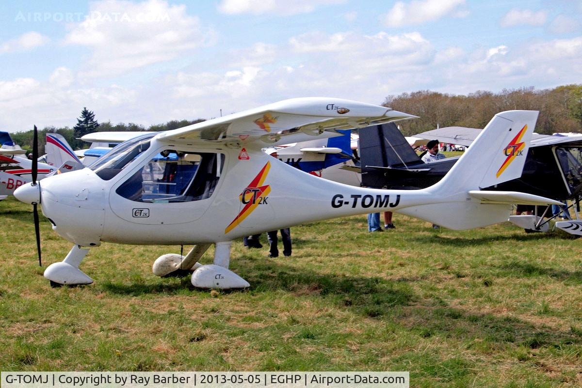 G-TOMJ, 2003 Flight Design CT2K C/N 7975, Flight Design CT-2K [03.01.04.14] Popham~G 05/05/2013. Minor change with red triangle added under the wing compared to earlier image in 2006