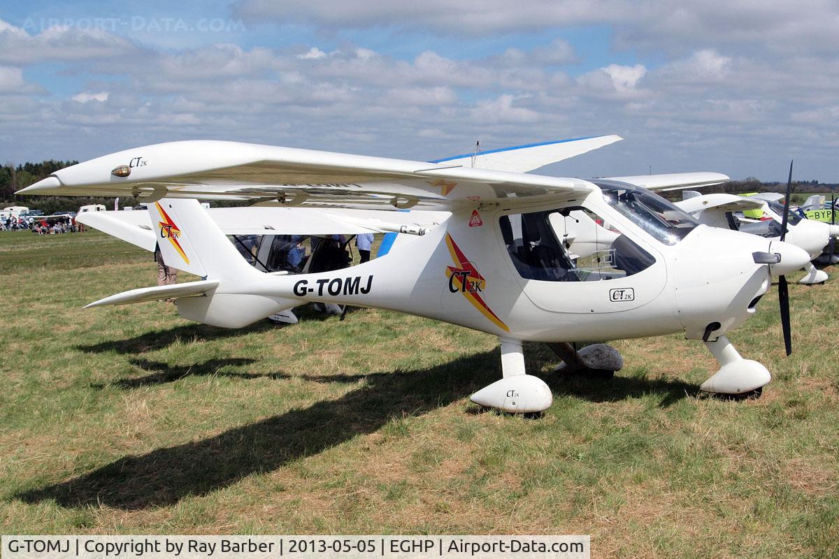 G-TOMJ, 2003 Flight Design CT2K C/N 7975, Flight Design CT-2K [03.01.04.14] Popham~G 05/05/2013. Minor change with red triangle added under the wing compared to earlier image in 2006