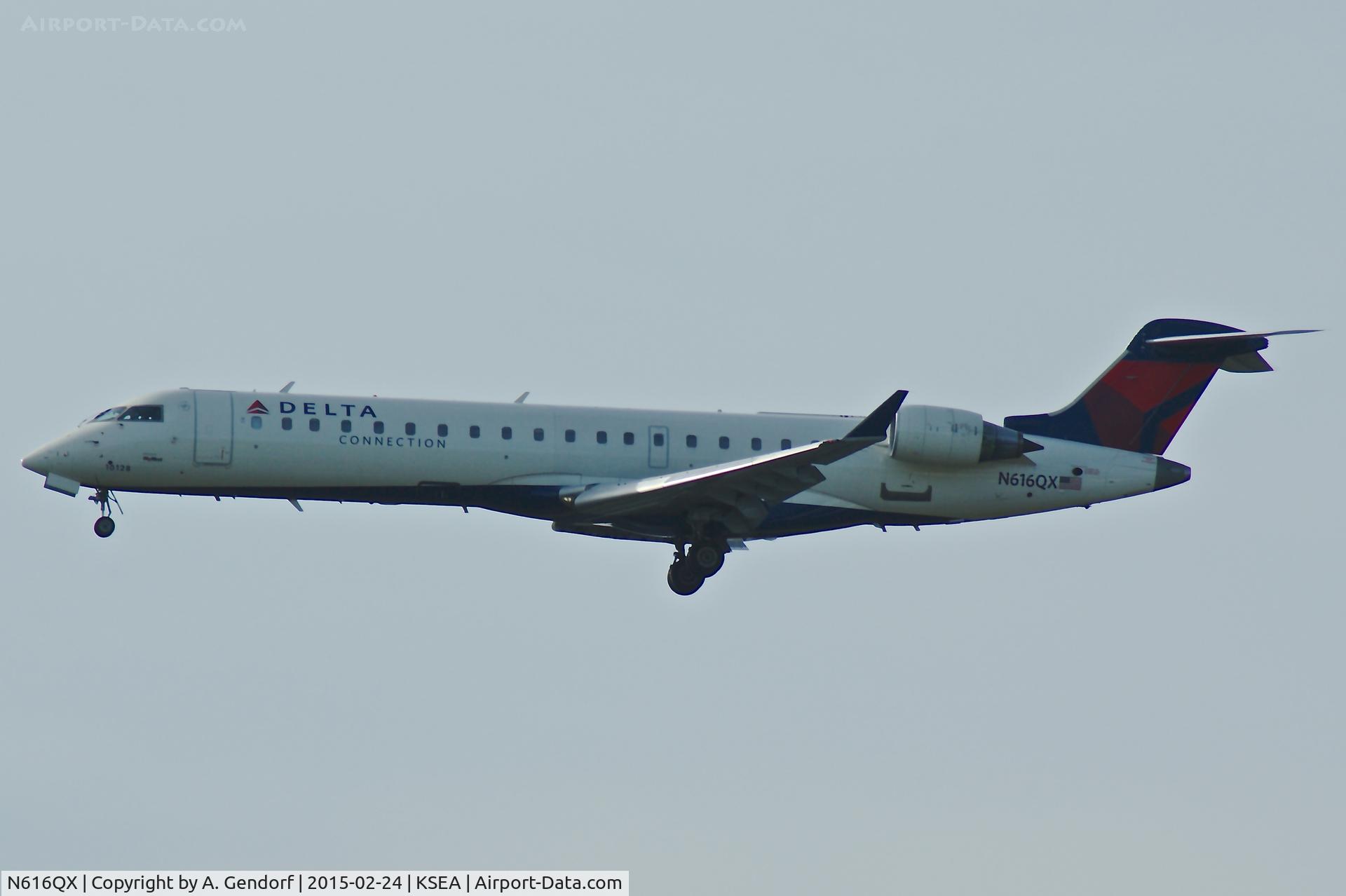 N616QX, 2003 Bombardier CRJ-701 (CL-600-2C10) C/N 10128, Sky West, Delta Connection cs., is here landing at Seattle-Tacoma Int'l(KSEA)