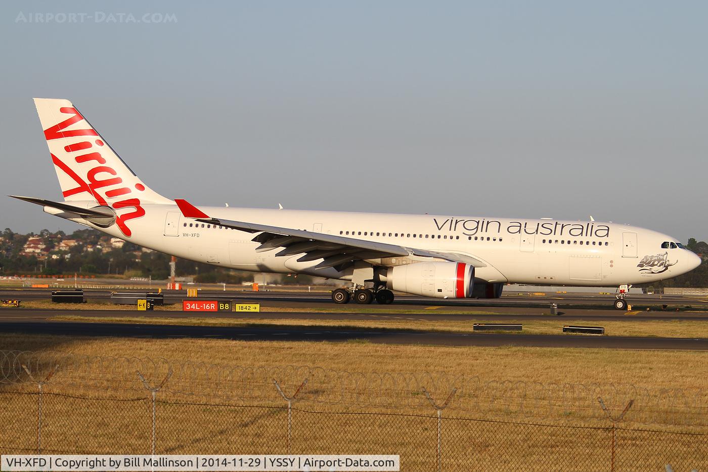 VH-XFD, 2012 Airbus A330-243 C/N 1306, taxiing to gate