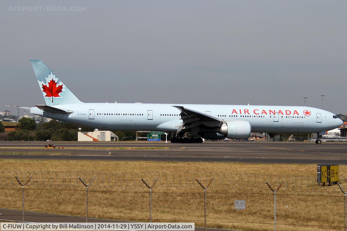 C-FIUW, 2008 Boeing 777-333/ER C/N 35249, taxiing from 34L