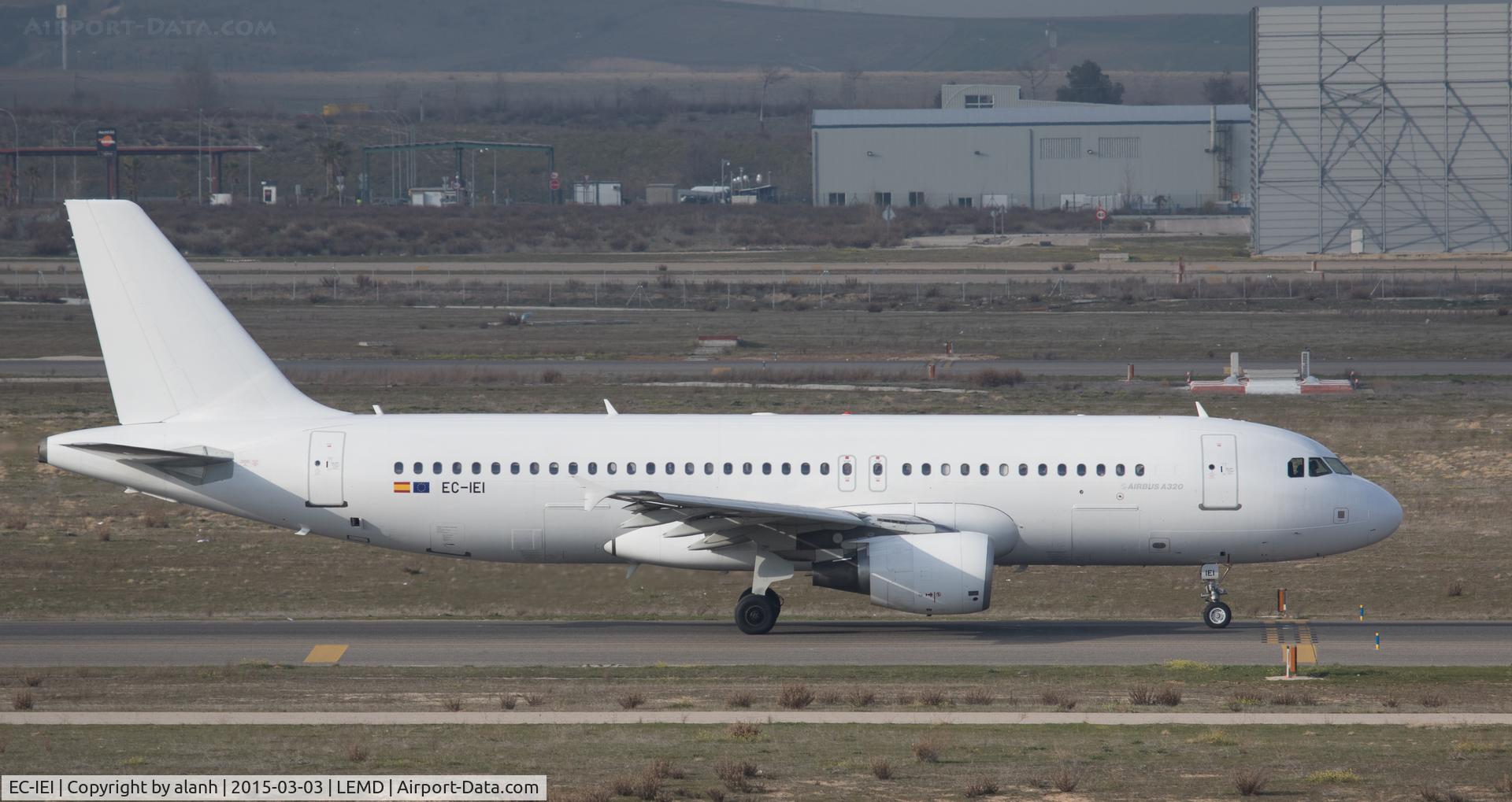 EC-IEI, 2001 Airbus A320-214 C/N 1694, Taxying at Madrid; in an all-white scheme without titles