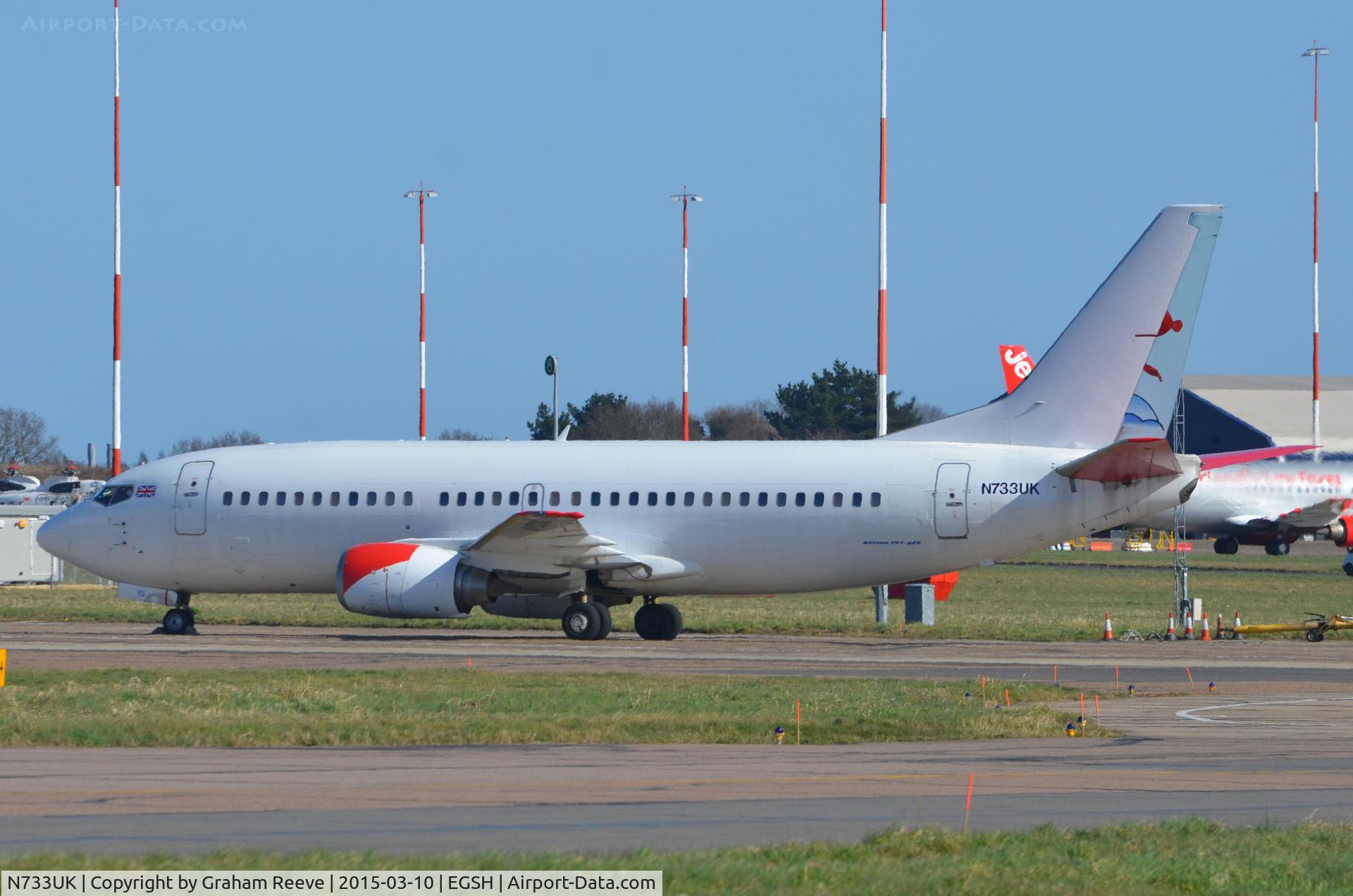 N733UK, 1994 Boeing 737-3Q8 C/N 26307, Parked at Norwich.