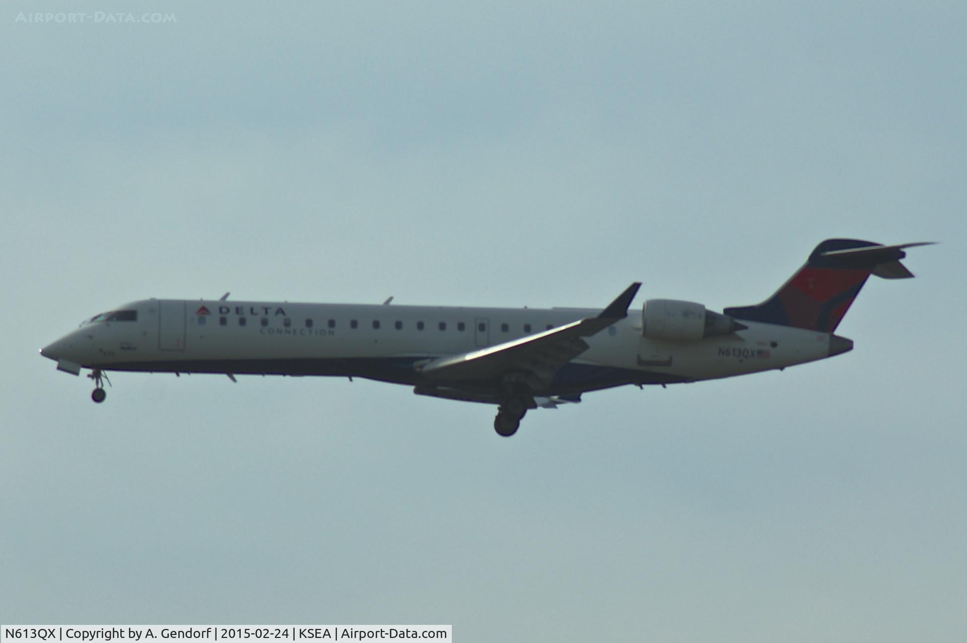 N613QX, 2002 Bombardier CRJ-701 (CL-600-2C10) Regional Jet C/N 10045, Sky West, Delta Connection cs., is here on short finals at Seattle-Tacoma Int'l(KSEA)