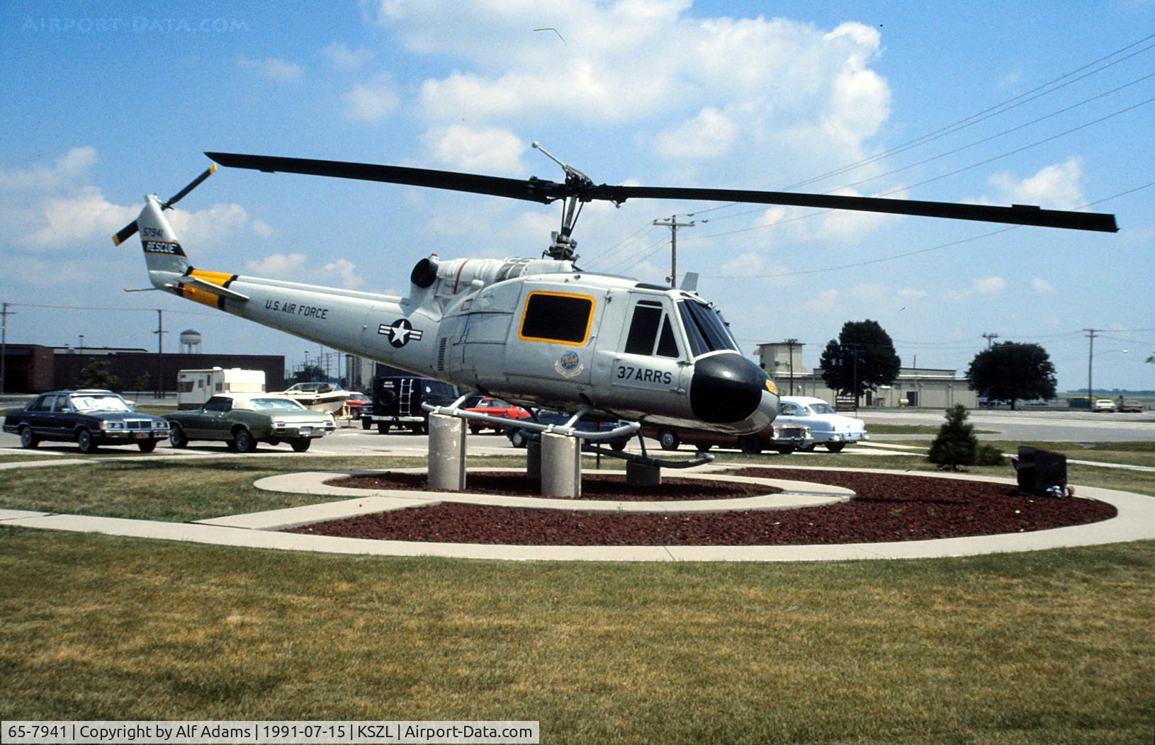 65-7941, 1965 Bell UH-1P Iroquois C/N 7082, At Whiteman Air Force Base, Missouri in 1991. This aircraft was originally built as a UH-1F, but later converted to a UH-1P.