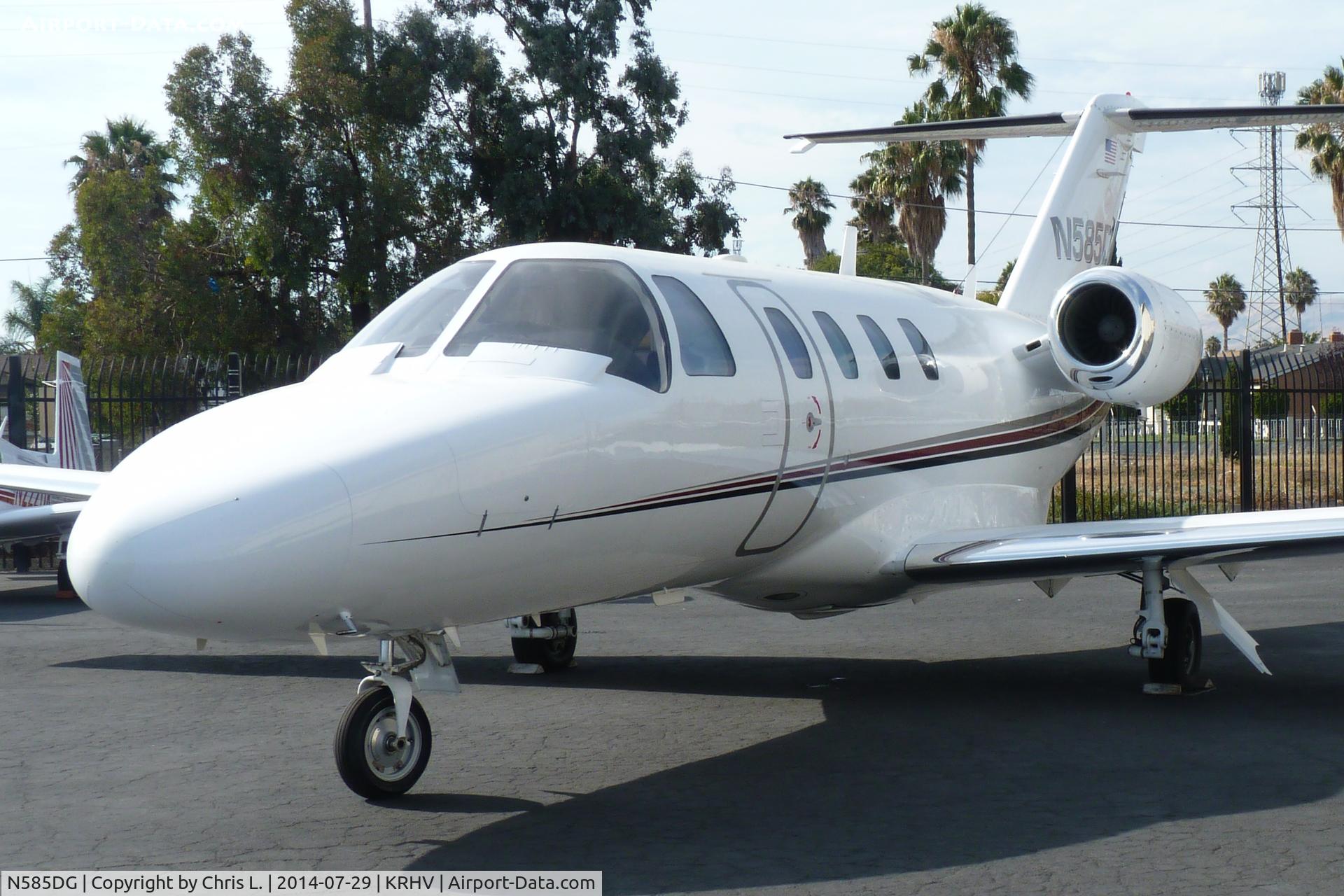 N585DG, 1994 Cessna 525 Citation Jet C/N 525-0057, Once locally-based Cessna Citation Jet 1 sitting in front of the Lafferty Aircraft Sales hangar waiting to be sold at Reid Hillview Airport, San Jose, CA.