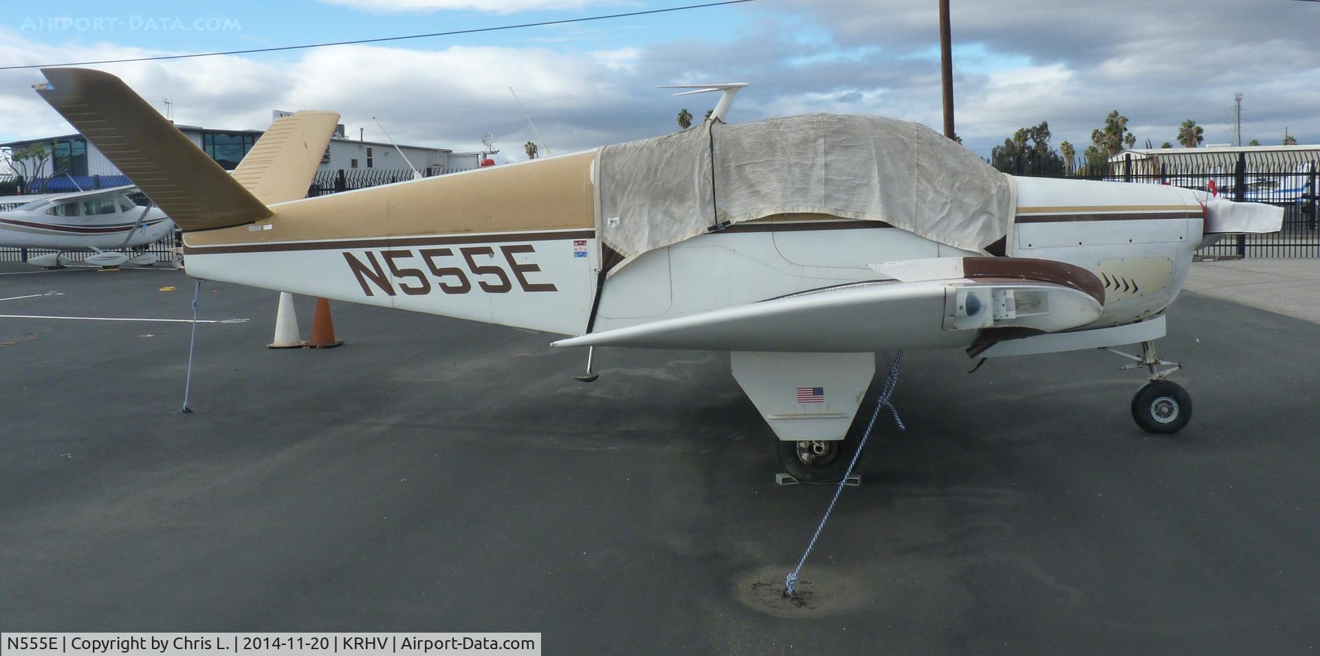 N555E, 1959 Beech K35 Bonanza C/N D-5845, A local Beechcraft Bonanza K35 with the V tail sits in front of the Discovery Air hangar.