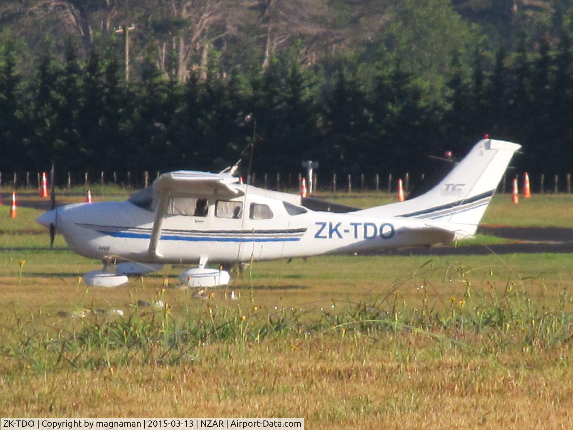 ZK-TDO, 2002 Cessna T206H Turbo Stationair C/N T20608358, Long shot across airfield