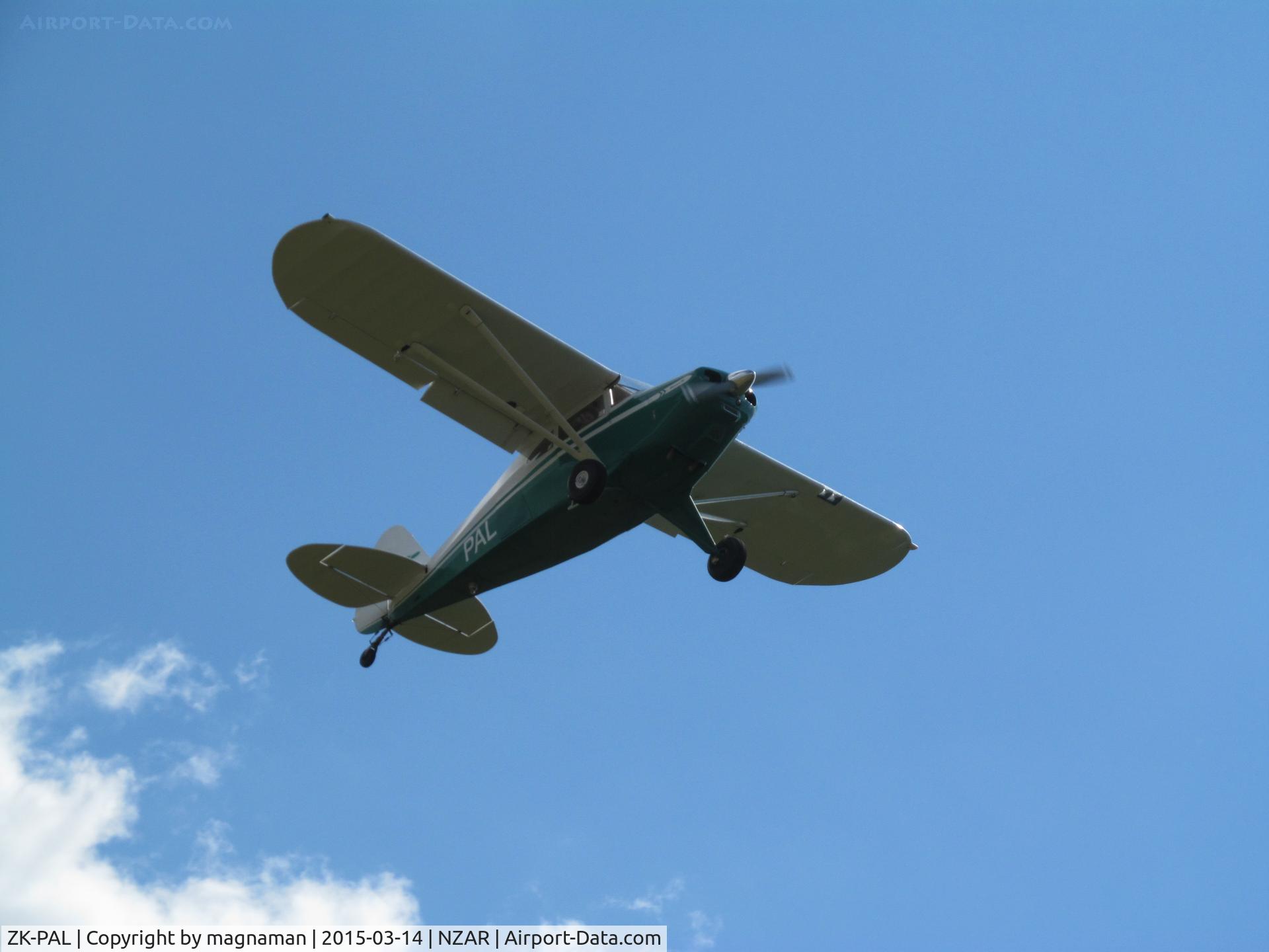 ZK-PAL, 1954 Piper PA-22-135 Tri-Pacer C/N 22-2298, short finals over car