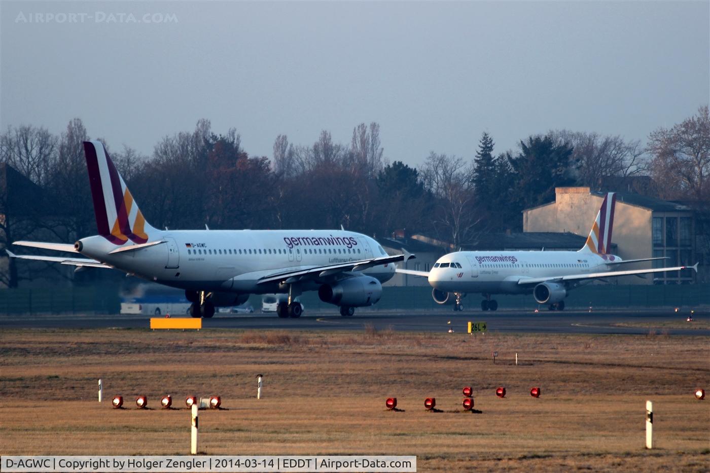 D-AGWC, 2006 Airbus A319-132 C/N 2976, Coming and going at holding point 26L...