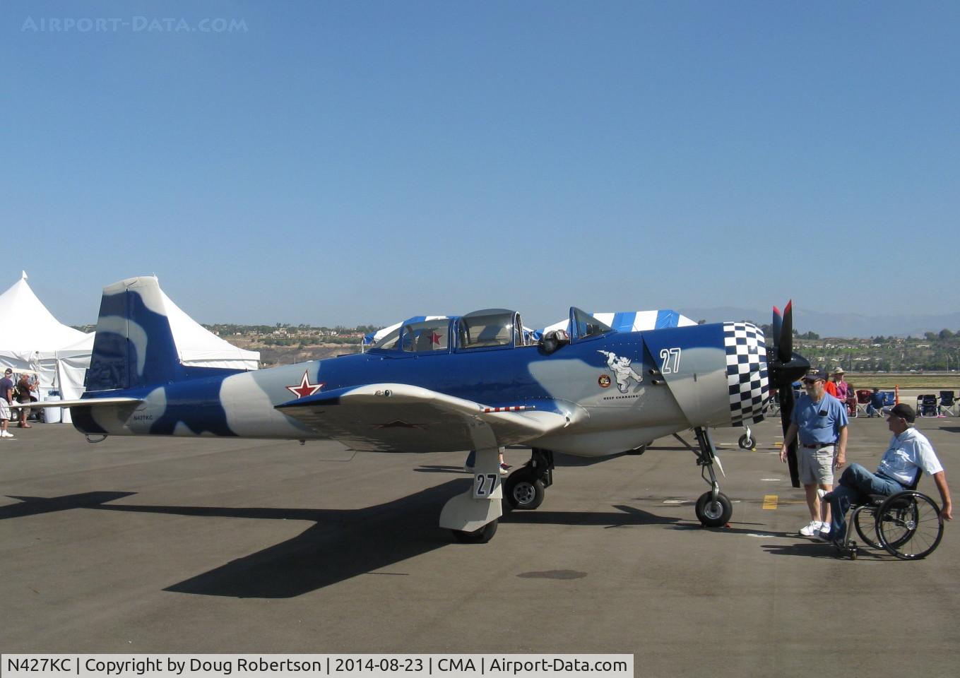 N427KC, 1985 Nanchang CJ-6A C/N 4332003, 1985 Nanchang China CJ-6A, Huosai 6A1J 285 Hp radial, with interested observers