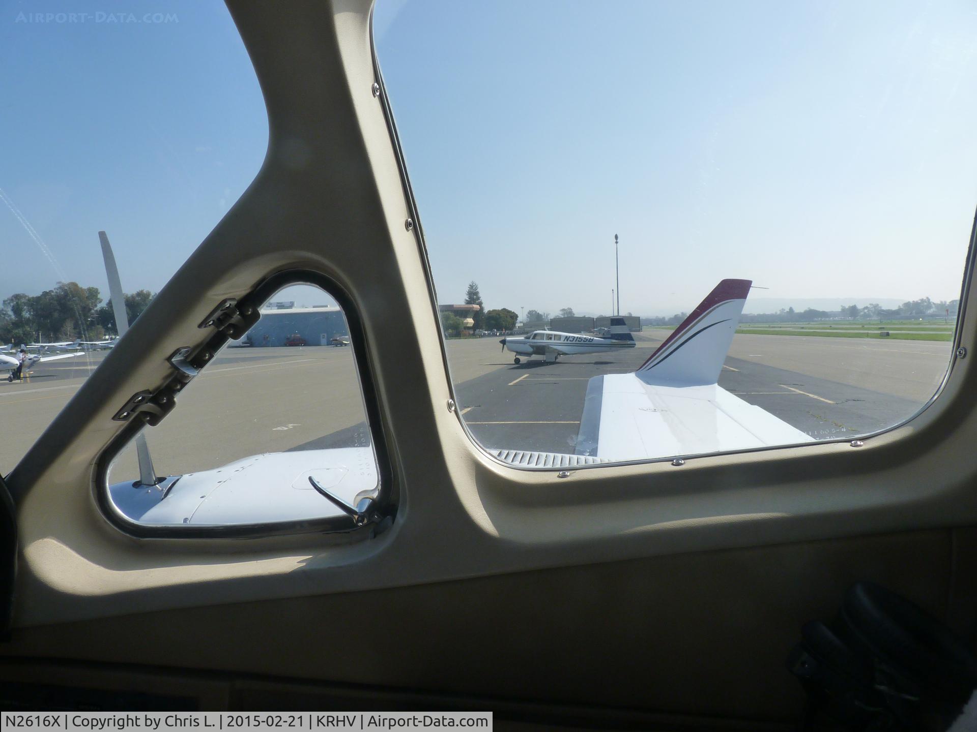 N2616X, Cessna 414A Chancellor C/N 414A0266, A side view out the cockpit window of the transient Cessna 414A, N2616X.