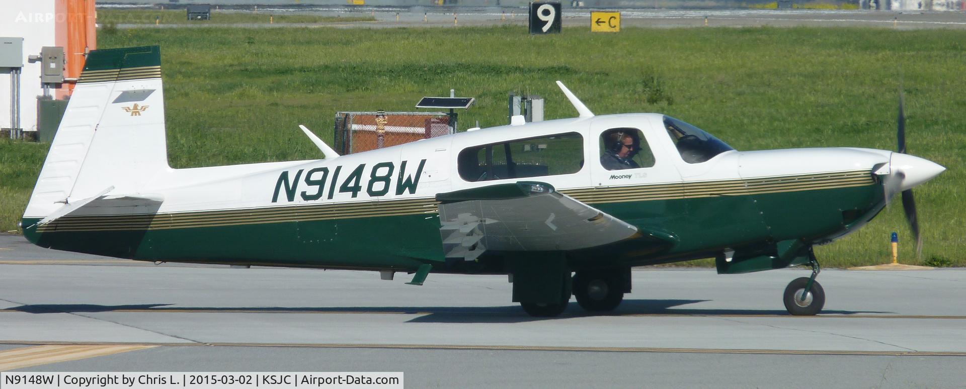 N9148W, 1991 Mooney M20M Bravo C/N 27-0106, A 1991 Mooney M20M taxis for full length departure at San Jose International Airport.
