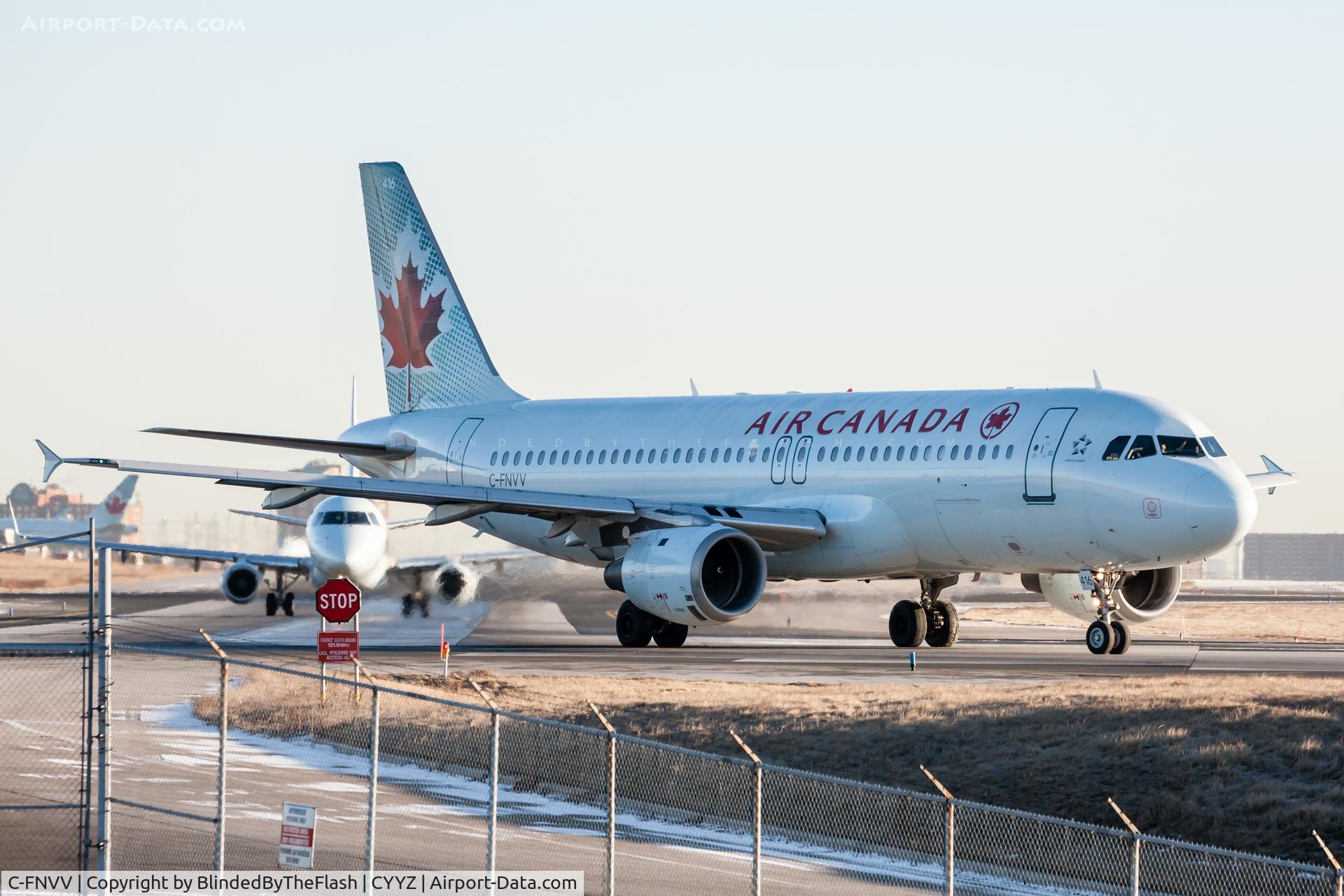 C-FNVV, 1993 Airbus A320-211 C/N 404, Taxiing for departure on 06L at Toronto Pearson