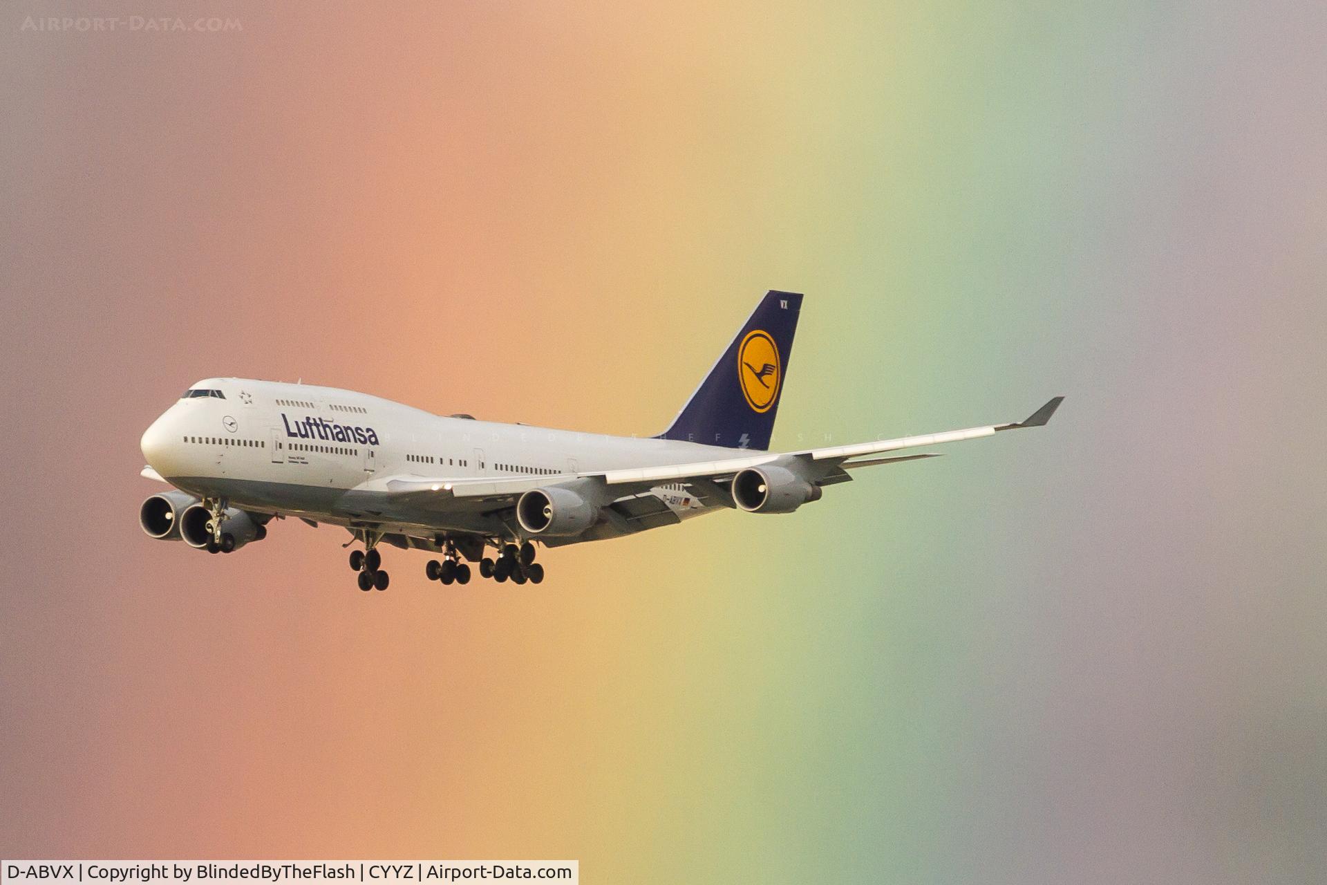D-ABVX, 1999 Boeing 747-430 C/N 29868, Passing a rainbow on final for 23 at Toronto Pearson
