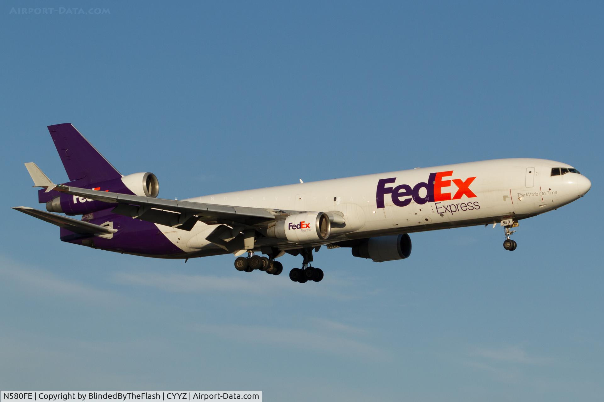 N580FE, 1993 McDonnell Douglas MD-11F C/N 48471, On short final for runway 23 at Toronto Pearson