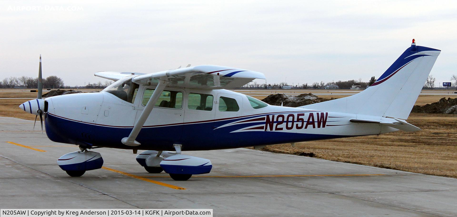 N205AW, 1963 Cessna 210-5A (205A) C/N 205-0522, Cessna 210-5A Super Skylane on the ramp in Grand Forks, ND.