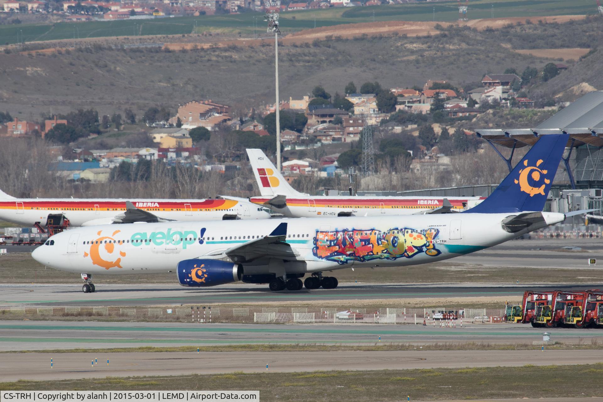 CS-TRH, 2007 Airbus A330-343X C/N 833, With Evelop titles; taxying to depart Madrid.