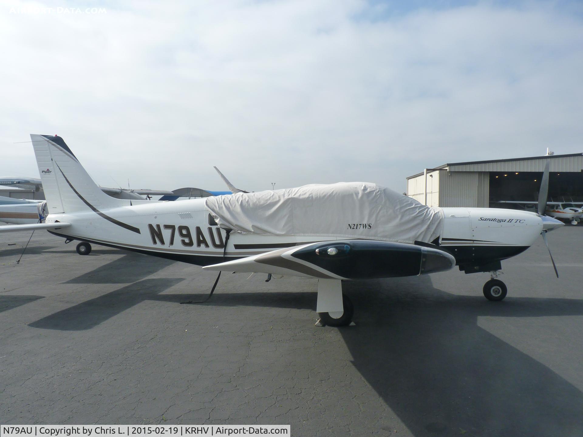 N79AU, Piper PA-32-301T Saratoga C/N 32-8024005, A local Piper 32 Saratoga sitting in front of the Lafferty Aircraft Sales hangar. This is 1 of the 2 local aircraft that park at Lafferty. The other is a CJ1, which I posted a pic of previously.