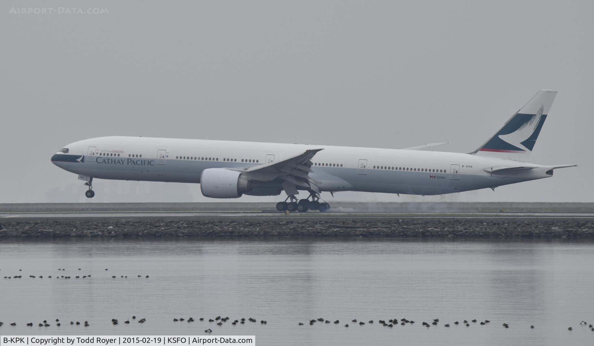 B-KPK, 2009 Boeing 777-367/ER C/N 36158, Landing at SFO on a foggy morning