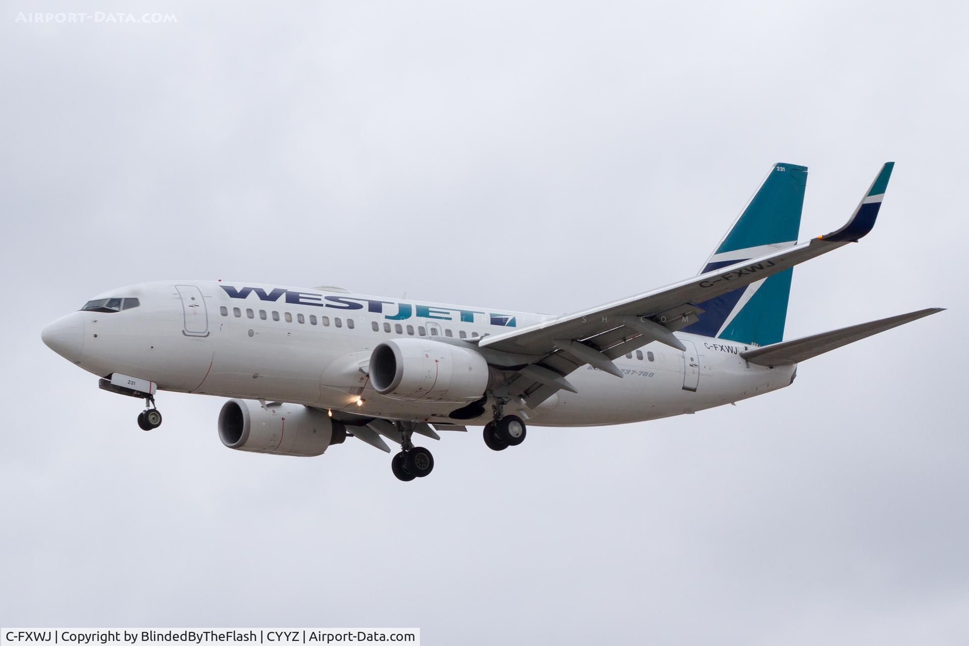 C-FXWJ, 2005 Boeing 737-7CT C/N 32768, Landing 24L at Toronto Pearson