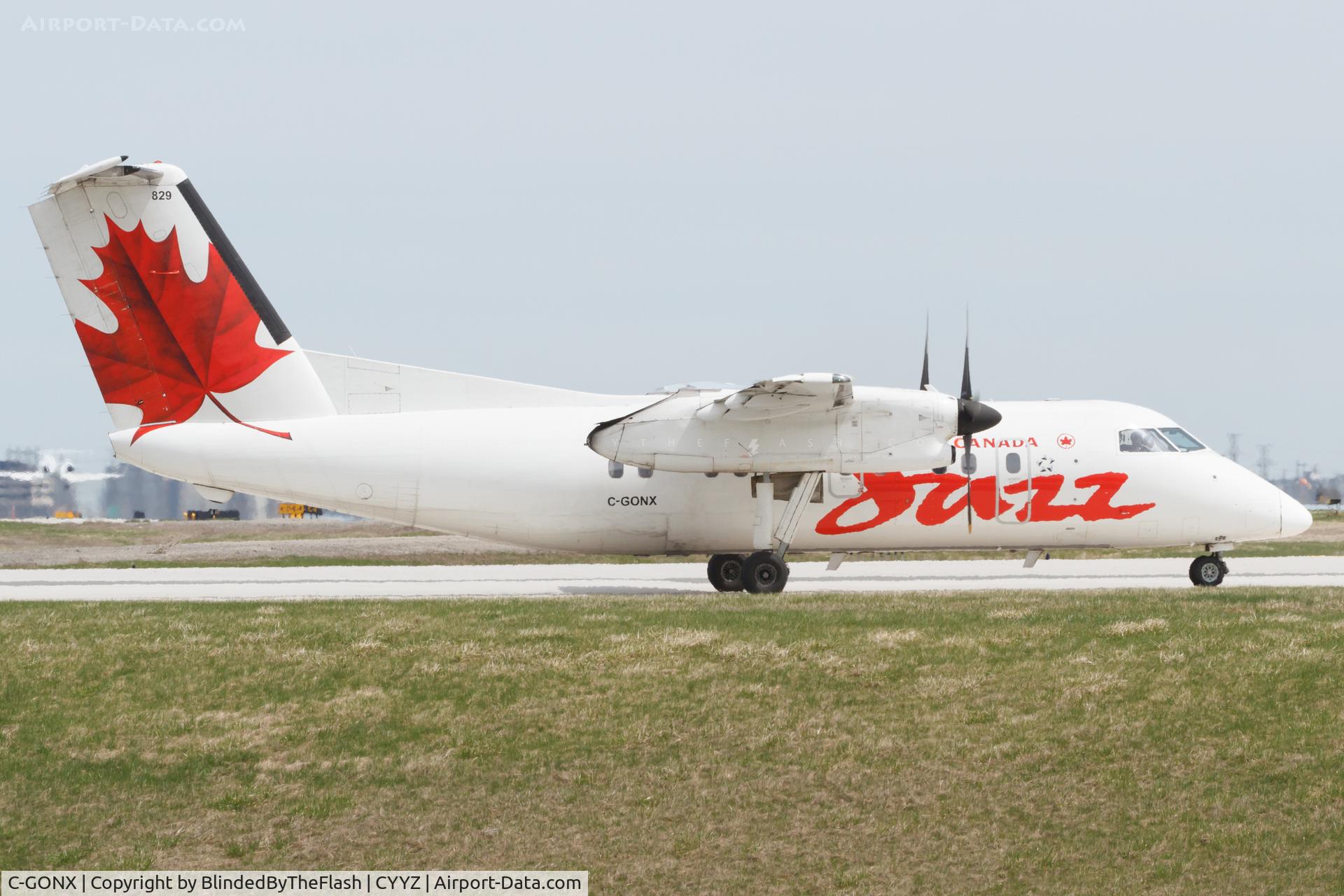 C-GONX, 1988 De Havilland Canada DHC-8-102 Dash 8 C/N 118, Holding short of 06L at Toronto Pearson