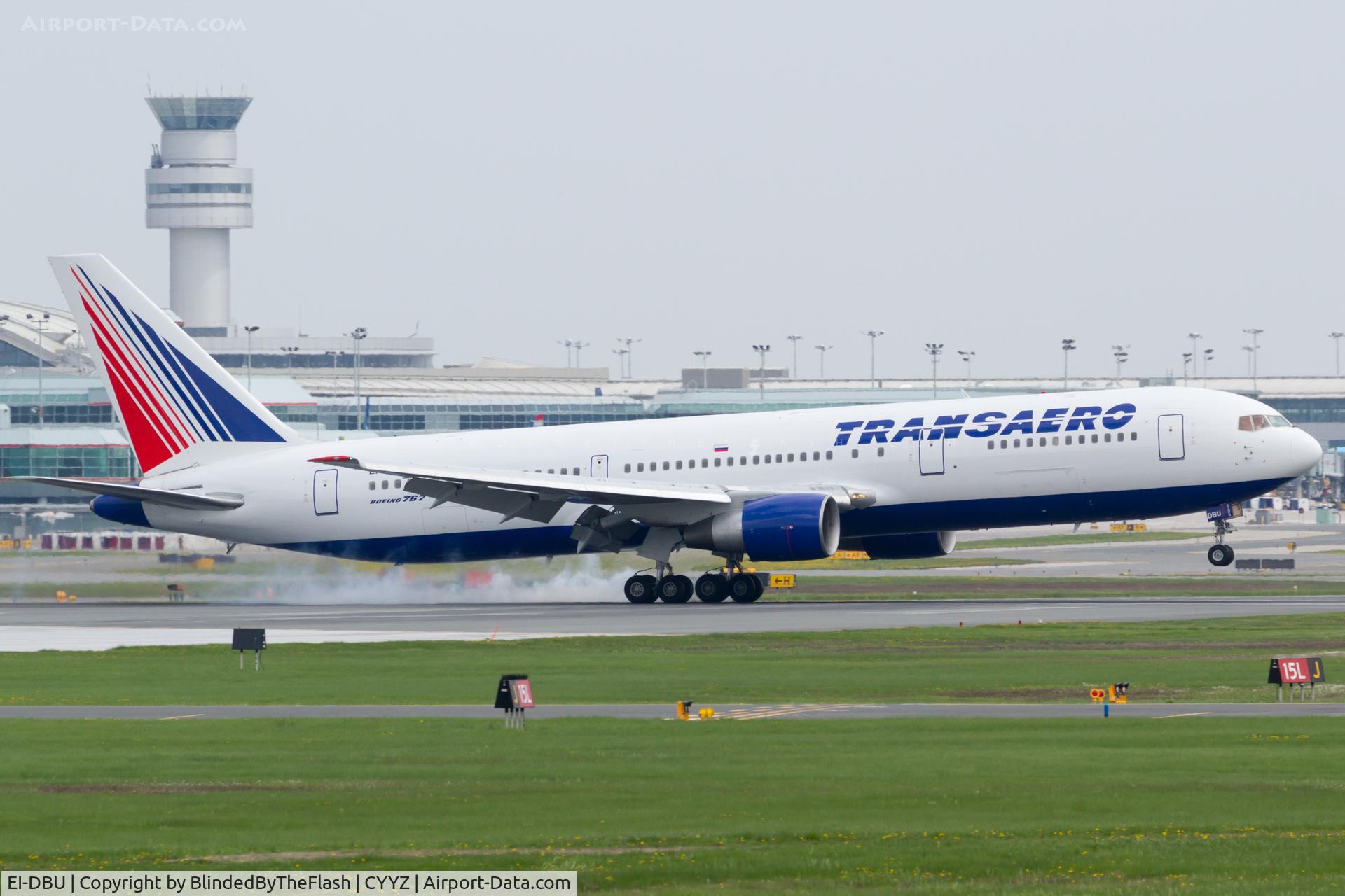 EI-DBU, 1991 Boeing 767-37E/ER C/N 25077, Torturing the rubber on runway 23 at Toronto Pearson