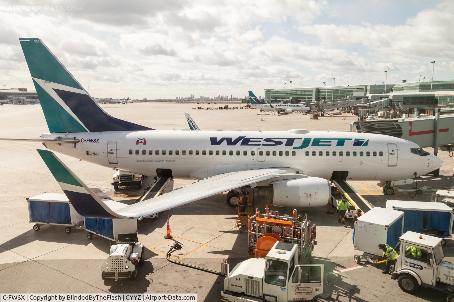 C-FWSX, 2004 Boeing 737-7CT C/N 32761, Parked at Terminal 3 at Toronto Pearson