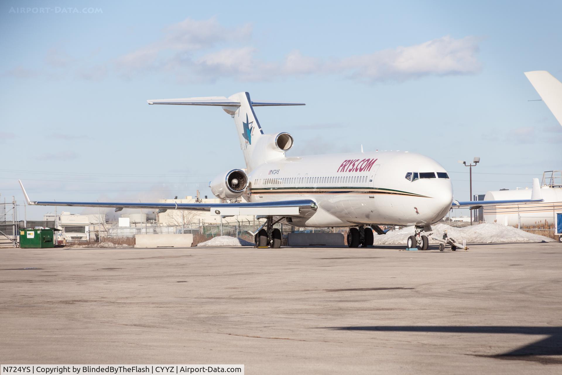 N724YS, 1978 Boeing 727-281 (Adv) C/N 21474, Frys.com and San Jose Sharks logo; team plane; parked at the north end of Toronto Pearson. (San Jose beat the Toronto Maple Leafs 4-1.)