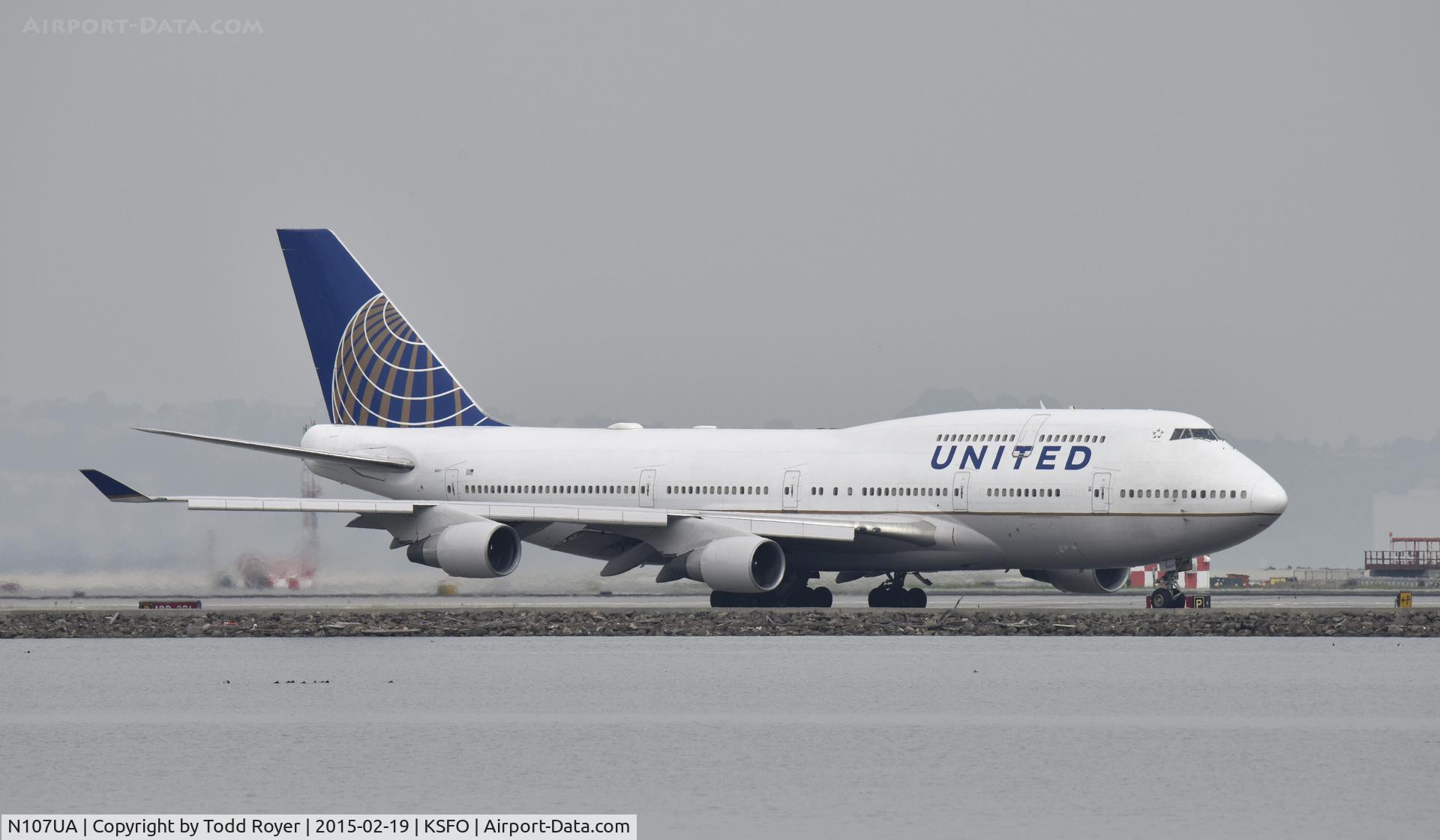 N107UA, 1998 Boeing 747-422 C/N 26900, Taxiing for departure at SFO