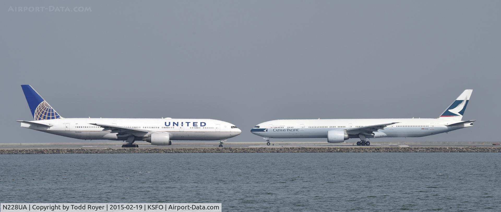 N228UA, 2002 Boeing 777-222 C/N 30556, Taxiing for departure at SFO
