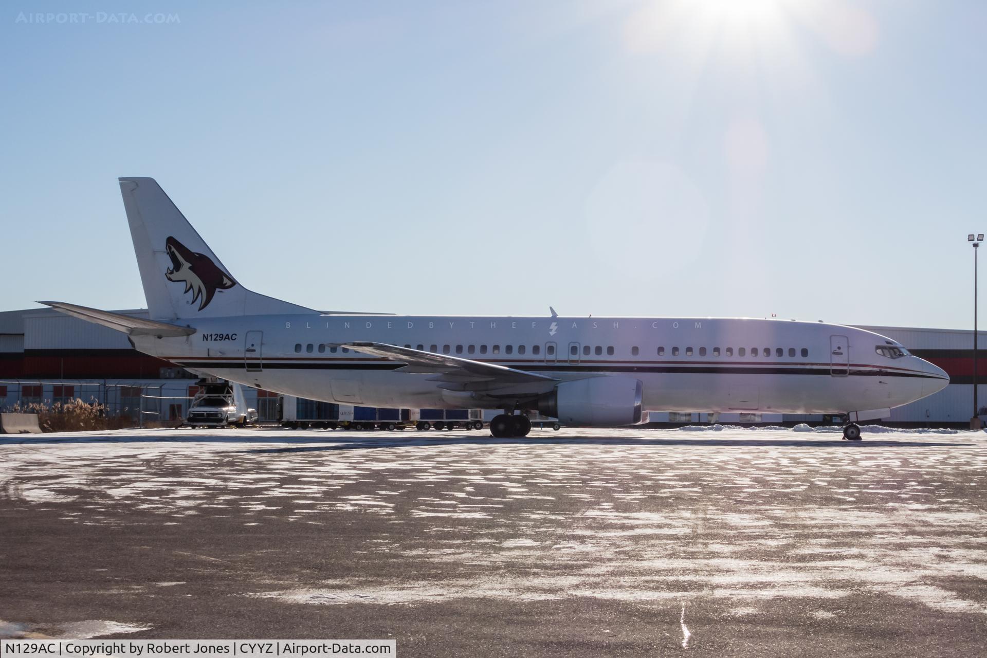 N129AC, 1992 Boeing 737-4Q8 C/N 26280, Phoenix (Arizona) Coyotes team plane parked at Toronto Pearson