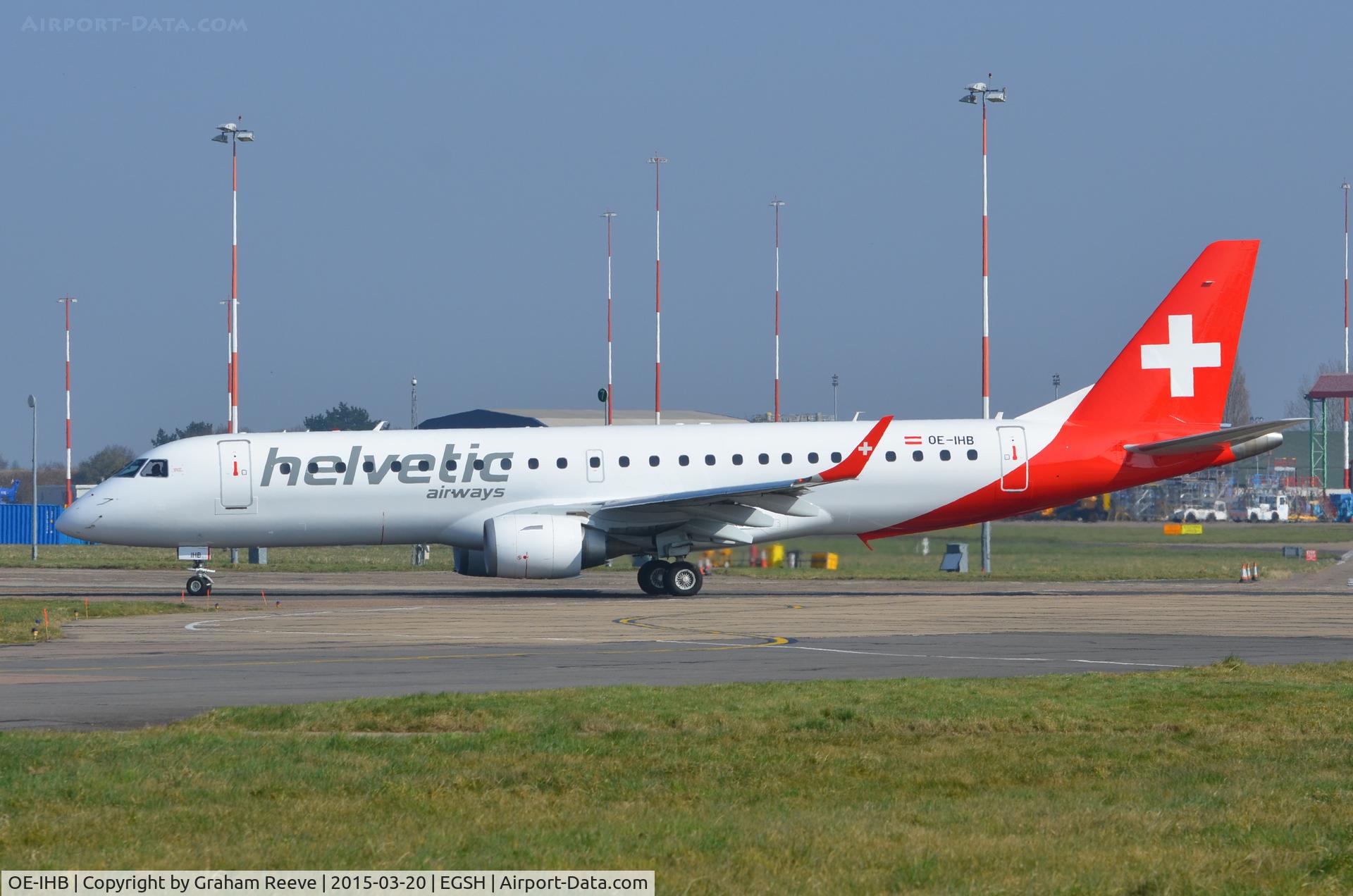 OE-IHB, 2009 Embraer 190LR (ERJ-190-100LR) C/N 19000294, Departing from Norwich after re-spray into Helvetic colours.