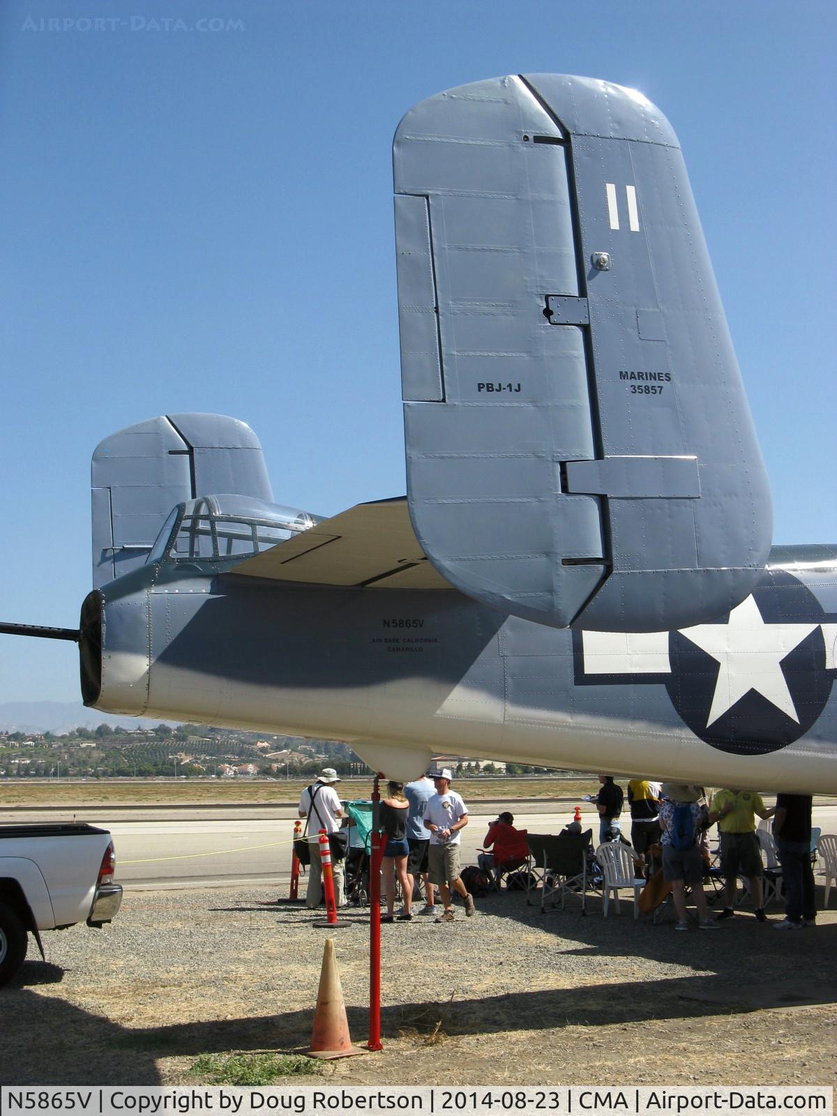 N5865V, 1945 North American B-25J Mitchell Mitchell C/N 108-34263, 1945 North American (B-25J) PBJ-1J 'SEMPER FI', two Wright Cyclone R2600-9 14 cylinder radials 1,700 Hp each, Limited class, twin tail and tail gun closeup.