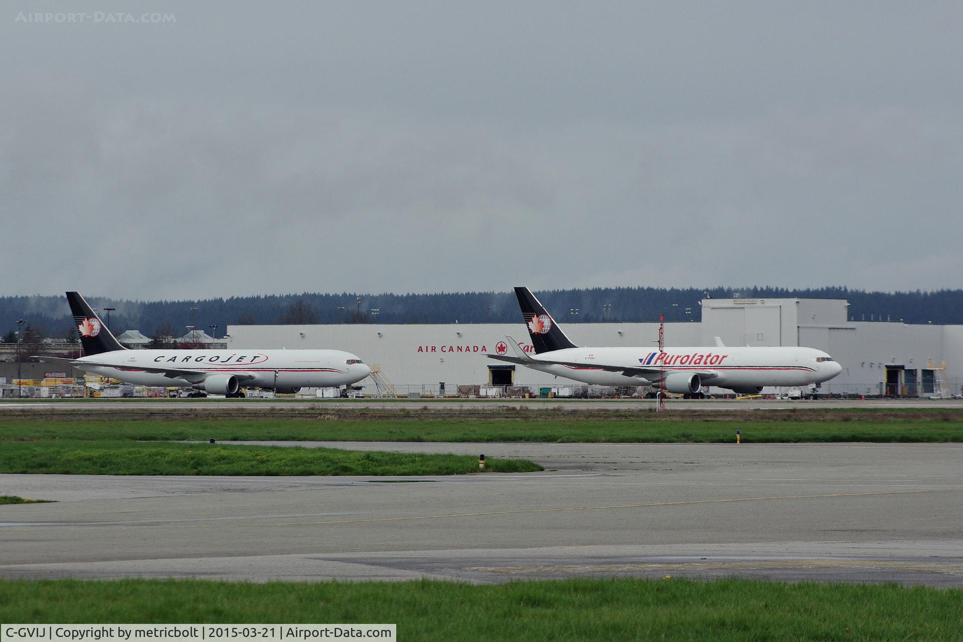 C-GVIJ, 1994 Boeing 767-328/ER C/N 27212, With C-FGSJ(Purolator) at YVR