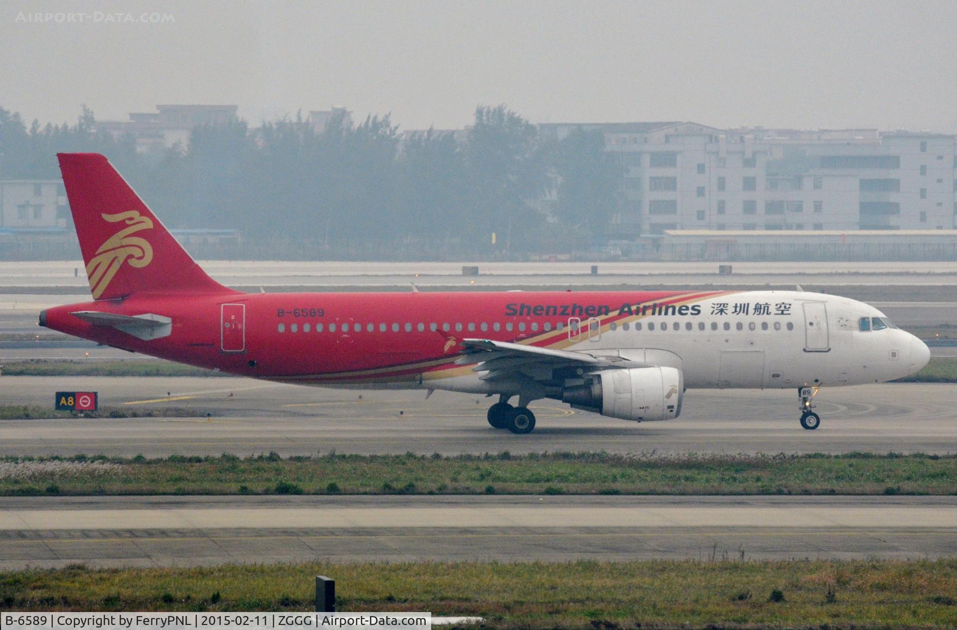B-6589, 2009 Airbus A320-214 C/N 4028, Shenzhen A320   in a murky CAN.