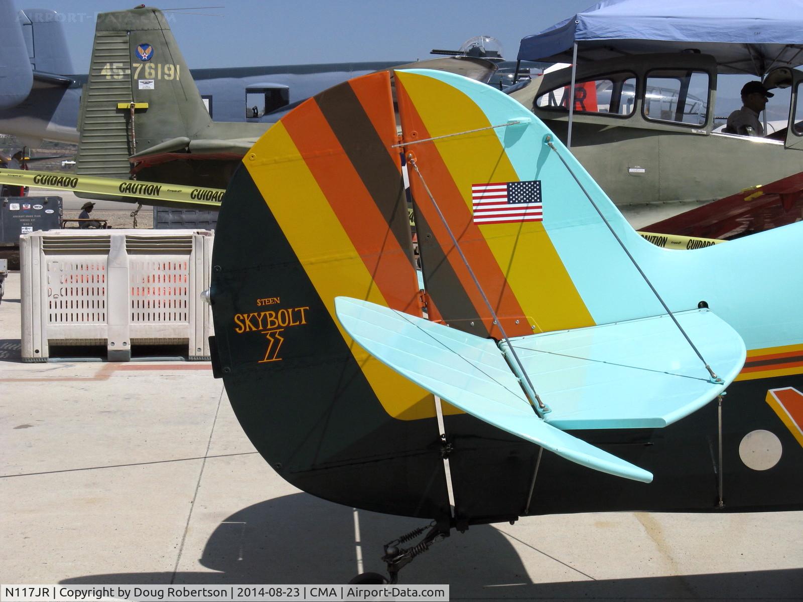 N117JR, 1986 Steen Skybolt C/N 1001 (N117JR), 1986 Ramsey STEEN SKYBOLT, Lycoming IO-360 180 Hp, tail logo, note double bracing of horizontal stabilizer