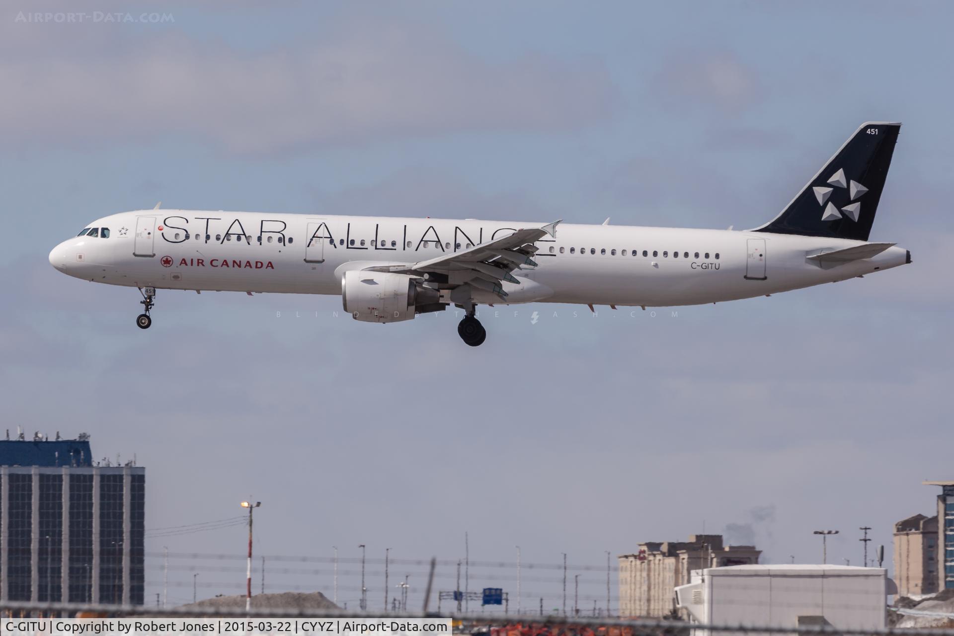 C-GITU, 2001 Airbus A321-211 C/N 1602, Landing 24R at Toronto Pearson