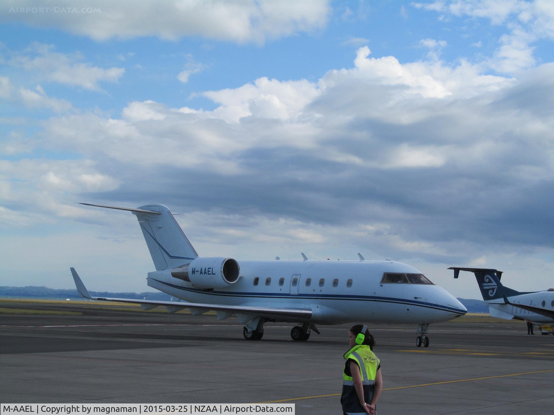 M-AAEL, 2005 Bombardier Challenger 604 (CL-600-2B16) C/N 5604, entering skycare facility apron